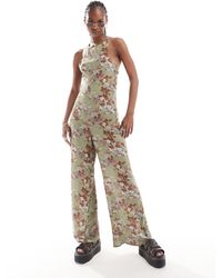 Reclaimed (vintage) - Tuta jumpsuit senza maniche a fiori - Lyst