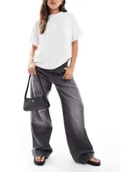 Stradivarius - Str Low Rise baggy Jean - Lyst
