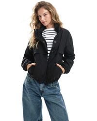 Barbour - Chaqueta Negra Con Capucha De - Lyst