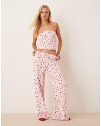 ASOS - Pantalon d'ensemble large et gaufré à petites fleurs - rose - Lyst