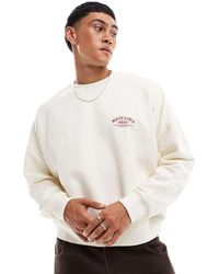 ASOS - Sudadera Color Crema De Corte Cuadrado Extragrande Con Hombros Caídos Y Estampado En El Pecho De -Beis Neutro - Lyst