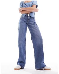 Levi's - – superlow – locker geschnittene jeans - Lyst