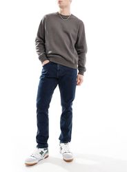 Tommy Hilfiger - Vaqueros Con Lavado Oscuro De Corte Tapered Slim Austin De -Azul - Lyst
