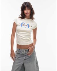 TOPSHOP - T-shirt à mancherons effet rétréci avec imprimé california en relief - babeurre - Lyst