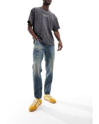 ASOS - – klassisch geschnittene jeans ohne stretchanteil mit waschung im 2000er-stil - Lyst