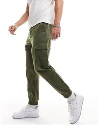 New Look - Pantaloni cargo kaki scuro - Lyst