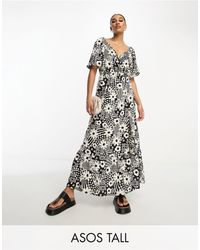 ASOS - Asos design tall - robe mi-longue à fleurs avec corsage cache-cœur boutonné et jupe avec ourlet à basque - noir et blanc - Lyst