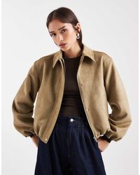 New Look - Veste en imitation daim à ourlet boule - fauve - Lyst