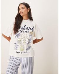 ASOS - Pigiama Con Stampa Weekend Self Care Composto Da Pantaloni A Fondo Ampio E T-Shirt Oversize - Lyst