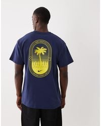 Nike - T-Shirt Oversize Con Logo E Stampa Di Palme Sul Retro - Lyst