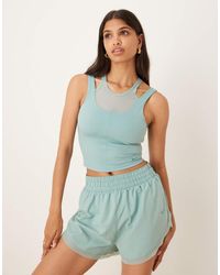 Nike - Nike One Training Dri-Fit Layered Vest - Lyst