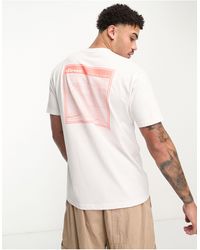 Ellesse - Meta - t-shirt bianca con stampa rosa sul retro - Lyst