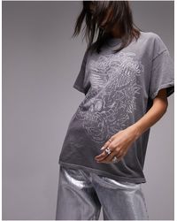 TOPSHOP - T-shirt oversize slavato con stampa grafica "rock" - Lyst