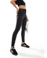 Noisy May - High Waist Coated Skinny Trouser - Lyst