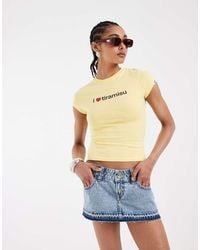 Hollister - Low Rise Denim Micro Skirt With Raw Hem - Lyst