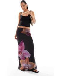 Stradivarius - Jupe longue en jersey à imprimé fleurs foncé - Lyst