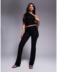 Kaiia - Exclusivité - - pantalon d'ensemble près du corps en dentelle double épaisseur avec ceinture - Lyst