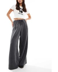 ASOS - Broek Van Corduroy Met Wijde Pijpen En Elastische Taille - Lyst
