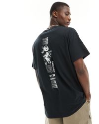 ASOS - Camiseta negra extragrande con estampado cósmico en la columna - Lyst