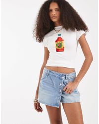 Vero Moda - High Waist Denim Mini Skort With Asymmetirc Button - Lyst