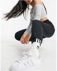 adidas originals ryv taping half zip sweat in periwinkle blue