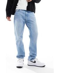 Tommy Hilfiger - Vaqueros De Corte Recto Holgado Con Lavado Claro Ethan De -Azul - Lyst