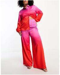 Flounce London - Pantaloni da abito a fondo ampio sfumati rosa e rosso a pieghe - Lyst