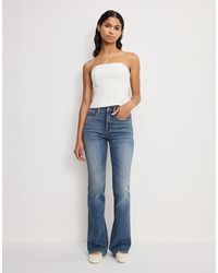 GOOD AMERICAN - Good Standard Bootcut Jeans - Lyst