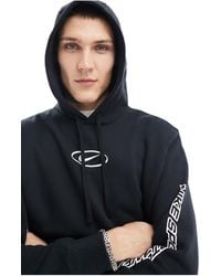 Nike - Sudadera negra con capucha y logo central swoosh - Lyst