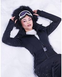 ASOS 4505 - Ski Belted Ski Suit With Slim Kick Leg And Faux Fur Hood - Lyst