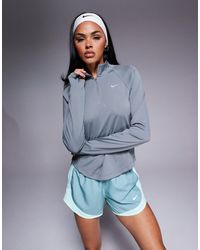Nike - Tempo - t-shirt à col zippé et manches longues en tissu dri-fit - Lyst
