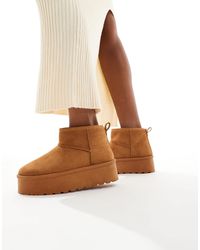 SEQWL - Mini Flatform Boots - Lyst