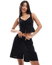 ONLY - Pantalones Cortos Negros Con Lazada Delantera De Tejido Efecto Lino Texturizado (Parte De Un Conjunto) - Lyst