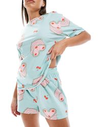 ASOS - Pyjama avec t-shirt oversize et short à imprimé gâteaux - Lyst