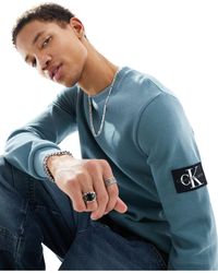 Calvin Klein - T-shirt gaufré à manches longues et logo écusson - Lyst