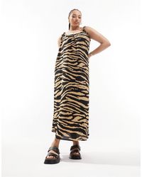 ASOS - Asos design curve - robe nuisette longue coupe trapèze avec bretelles à nouer et imprimé animal - Lyst