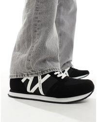 Armani Exchange - Sneakers nere e bianche con logo grande sul lato - Lyst