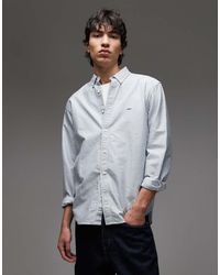 Levi's - Camisa Oxford A Rayas Blancas Y Azul Claro Abotonada Con Logo A Tono Authentic De - Lyst