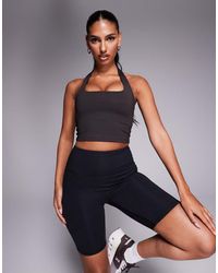 4505 - Top Tecnico Allacciato Al Collo Color Cioccolato Con Reggiseno Interno - Lyst