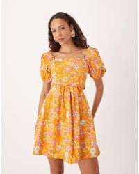 Collective The Label - Empire Line Cut Out Dress - Lyst