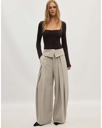Stradivarius - Wide-leg Trousers With Turned-up Waistband - Lyst