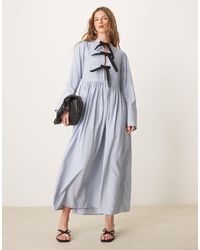 Ghospell - Robe mi-longue à détail nœud - rayé - Lyst