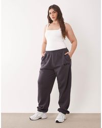 Kaiia - Plus Cotton Blend Embroidered Logo Cuffed Trackies - Lyst
