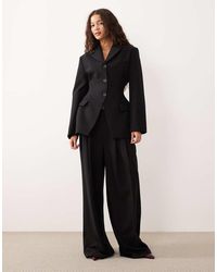ASOS - Elegante Broek Met Wijde Pijpen, Lage Taille En Asymmetrische Tailleband - Lyst
