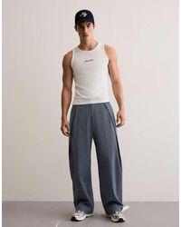 Bershka - Pantaloni Super Ampi Blu Con Pinces - Lyst