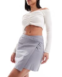 Pimkie - Mini-jupe portefeuille à rayures fines - Lyst