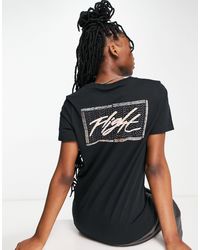 Nike - Camiseta negra con estampado en la espalda flight - Lyst