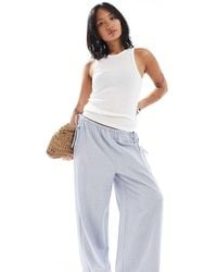 Only Petite - Pantaloni A Fondo Ampio A Righe Con Dettaglio Allacciato - Lyst