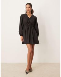 Ghospell - Vestido Corto Negro Carbón Con Lazada De - Lyst