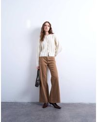 TOPSHOP - Pantaloni A Zampa Marroni A Vita Bassa - Lyst